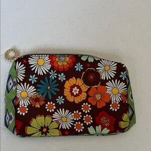 Estée Lauder makeup bag.